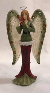Angel holding flower figurine