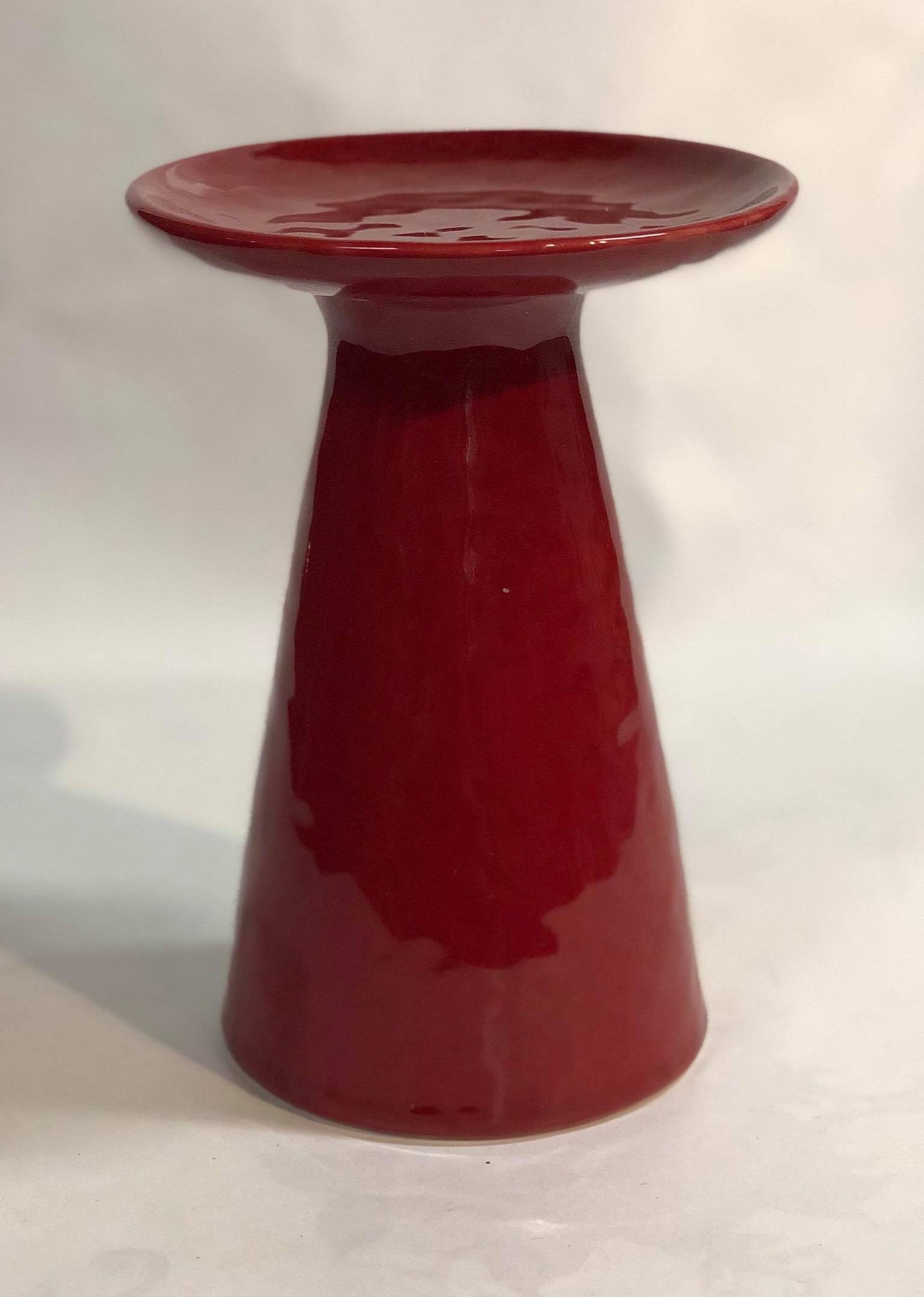 Red ceramic candle holder
