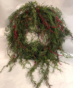Weeping cedar wreath with cones and berries