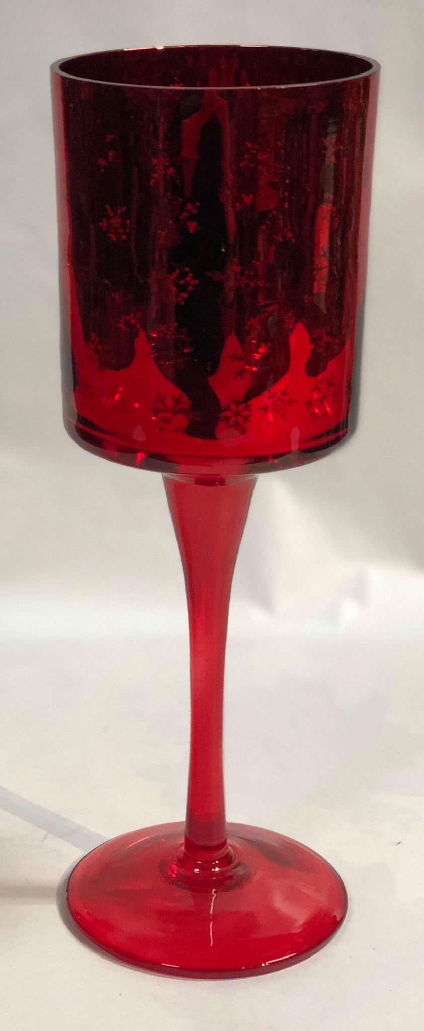 Red glass candle holder with snowflakes