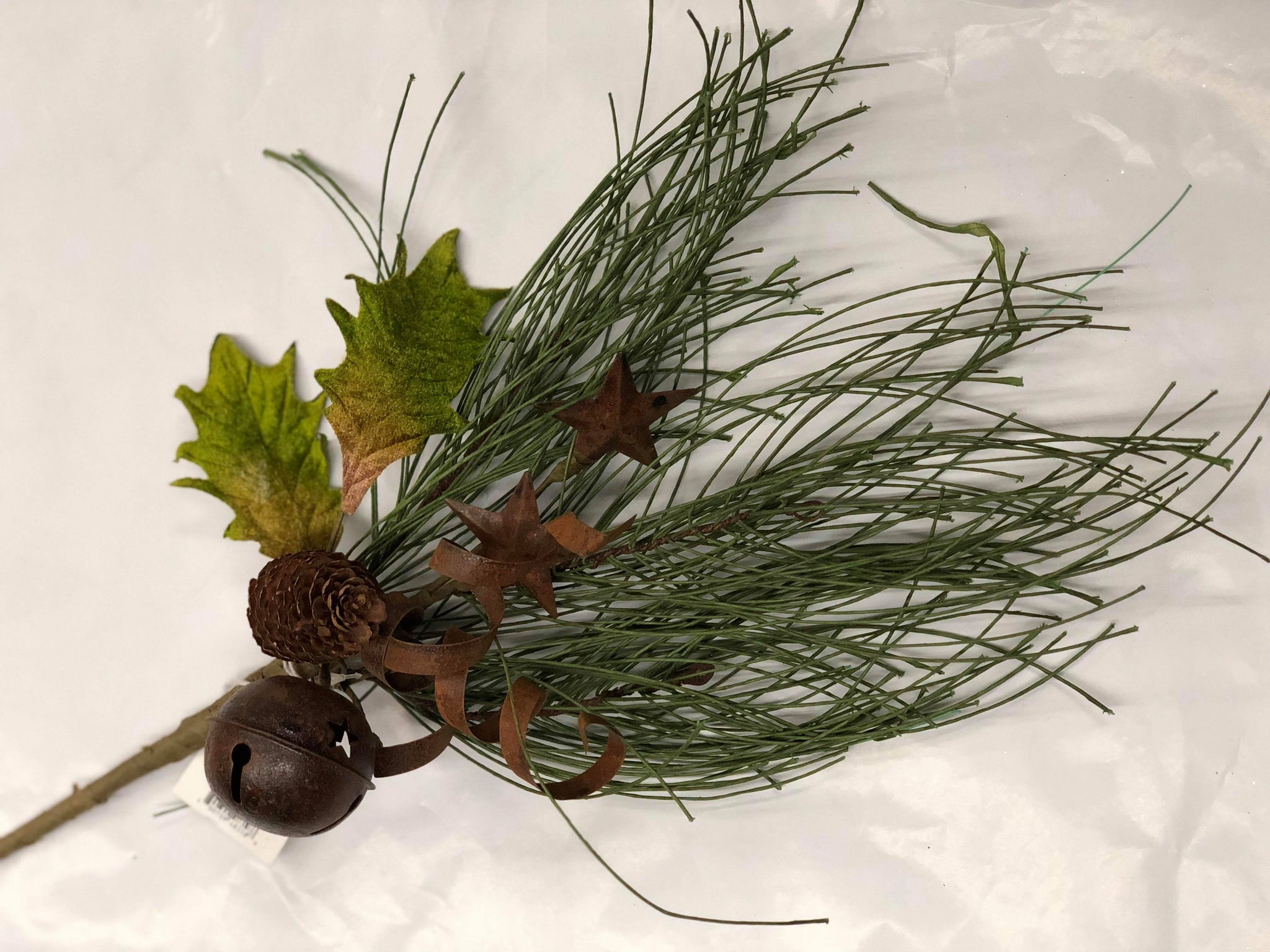 Bell and pine pick