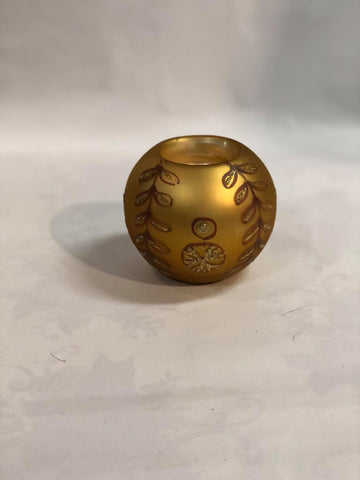 Gold candle holder with copper brown pattern