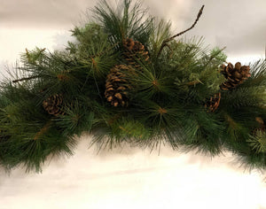 Mixed winter green arched swag