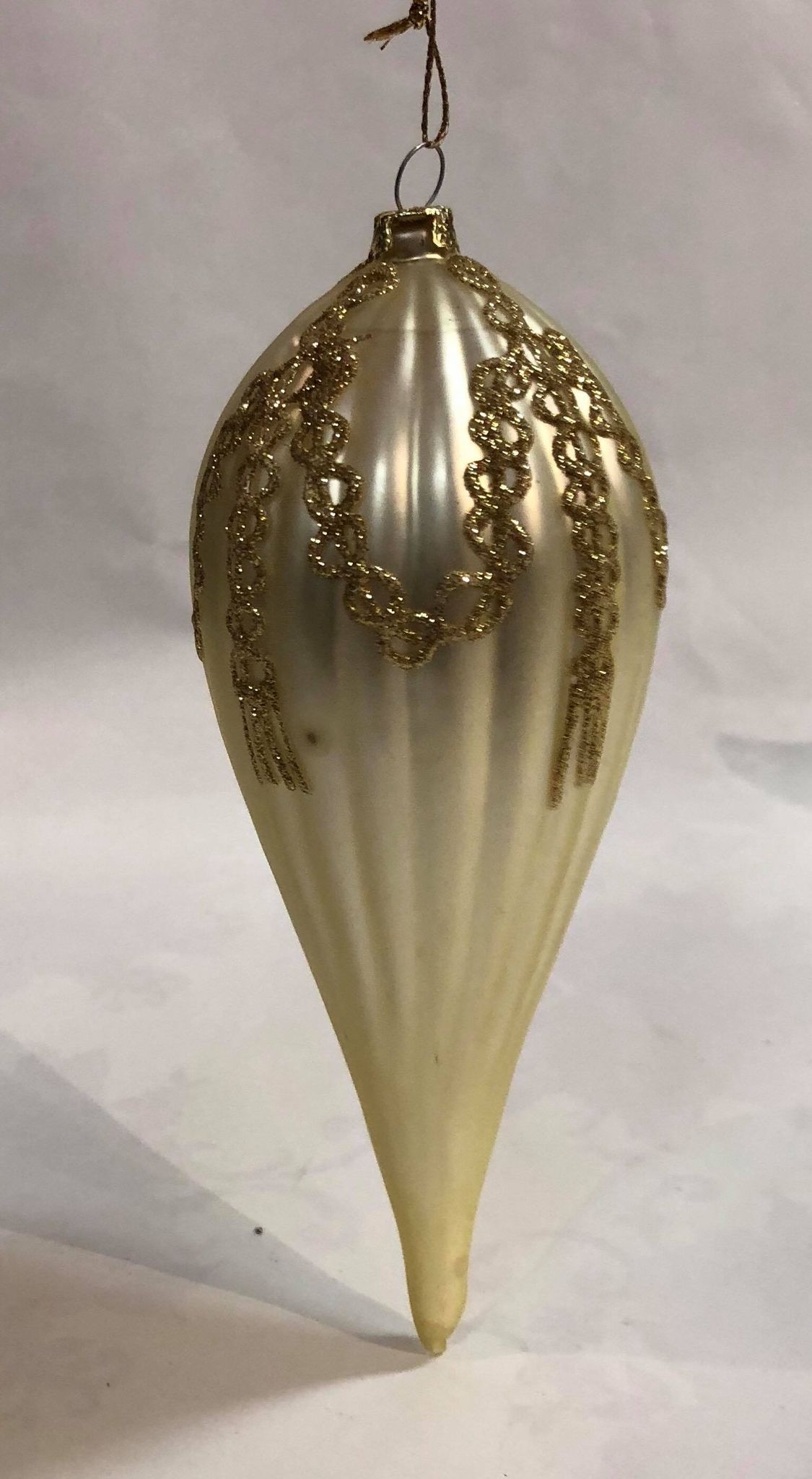 Gold glass ornament with gold details