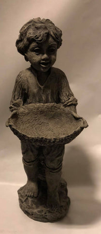 Little boy holding basket- Statue